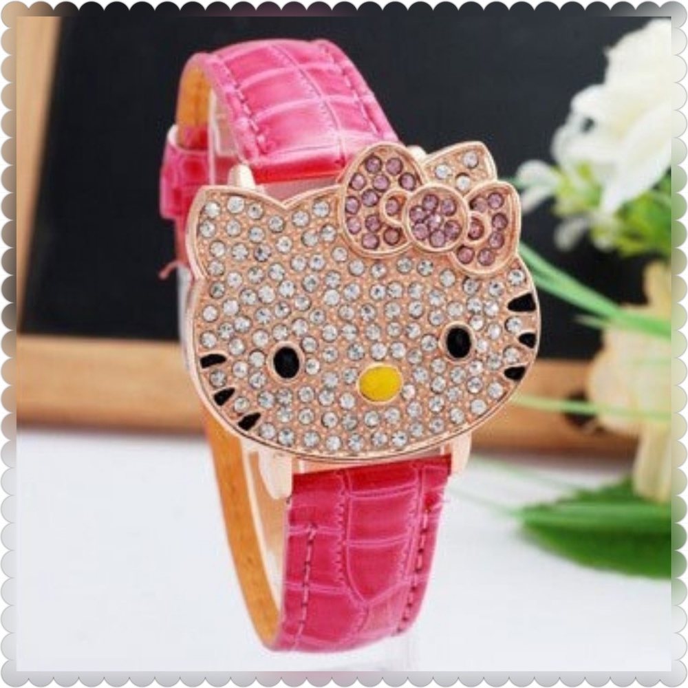 HELLO KITTY WOMANS GOLD TONE ICED OUT WOMANS FLIP